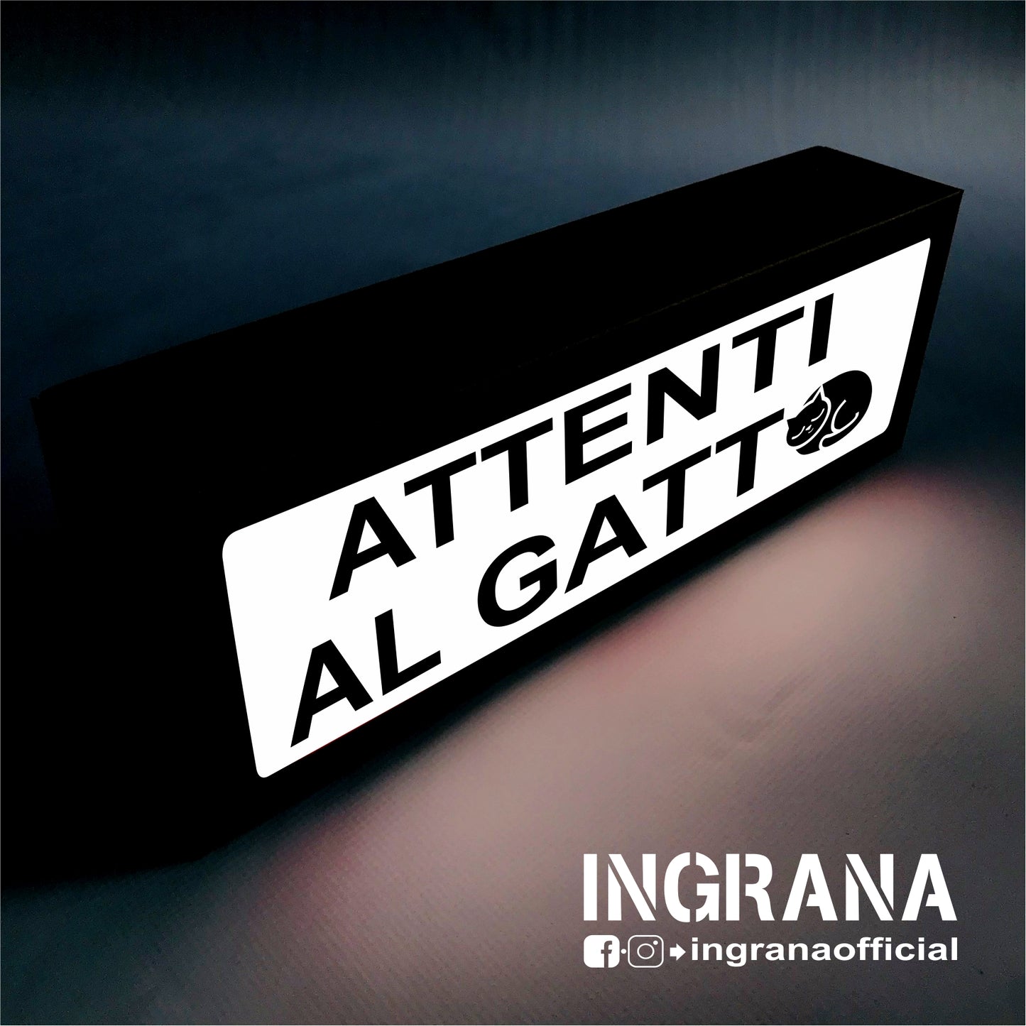 Insegna luminosa "ATTENTI AL GATTO"